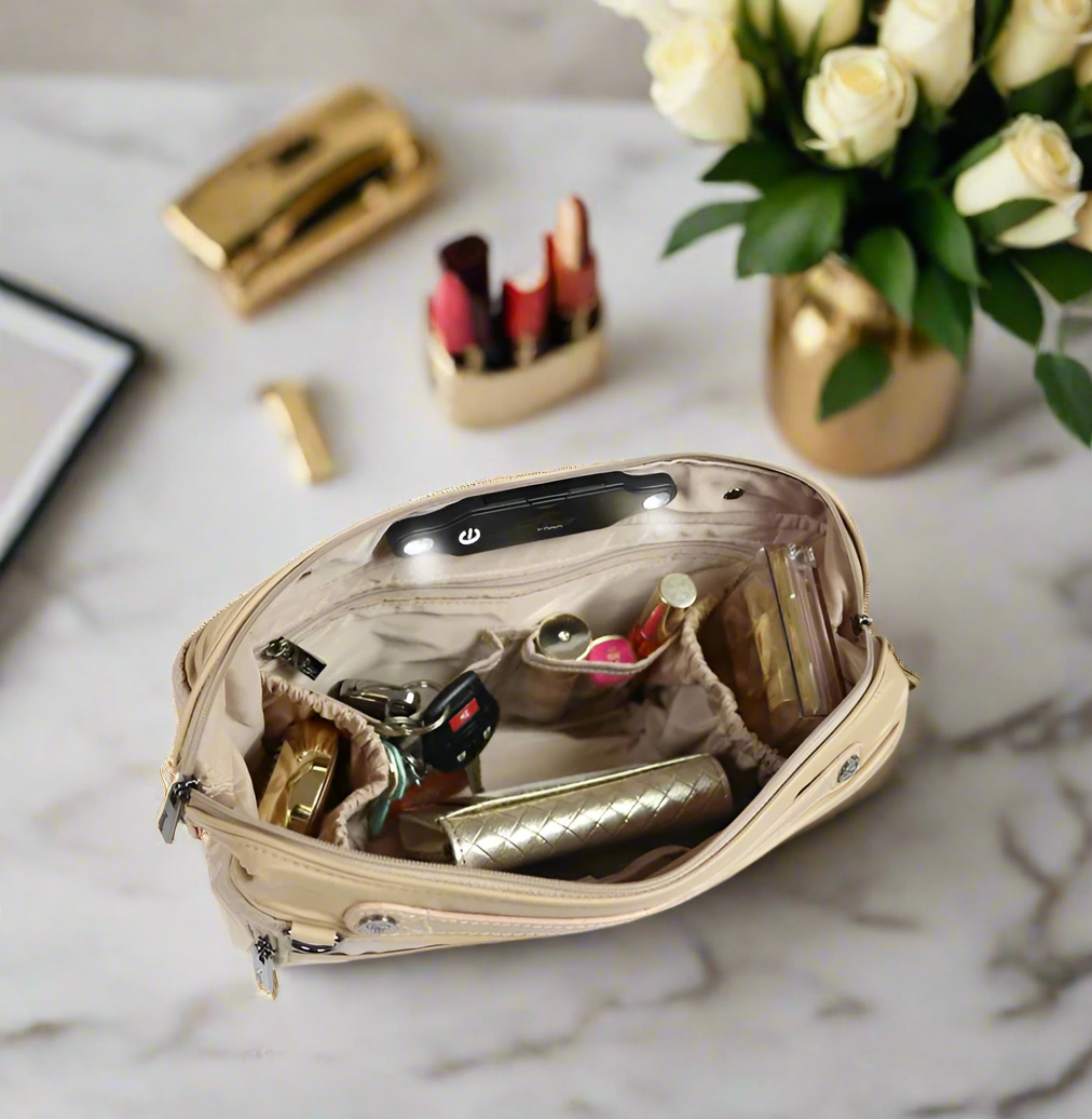 There's a Light Inside Oprah's Favorite Purse Organizer - Nude